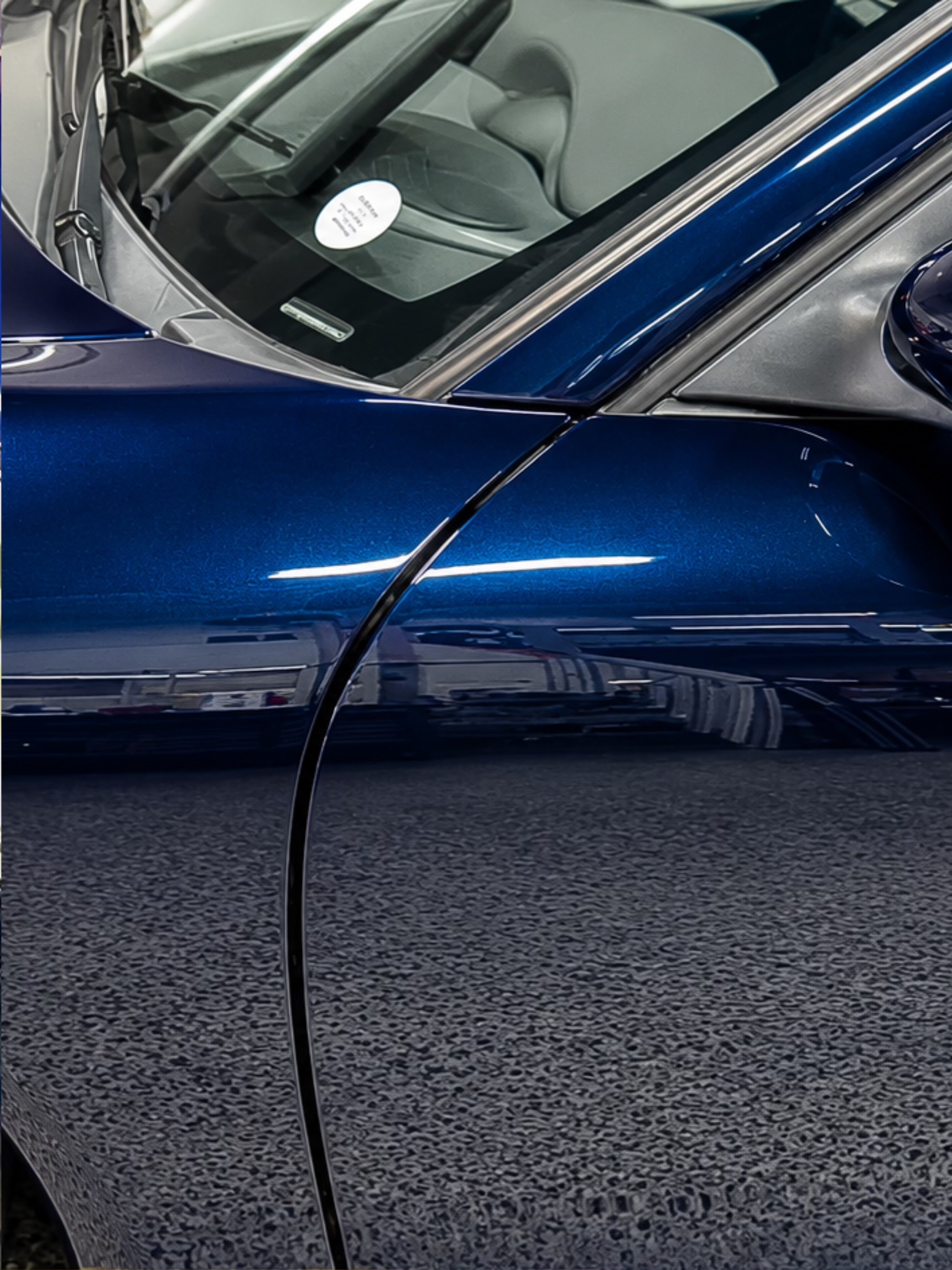 Blue Porsche side-panel and door detail